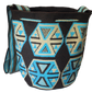 Artisan crochet bag with turquoise accents and traditional Wayuu design.