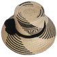 Minimalist Wayuu summer hat with geometric patterns and bold pompoms