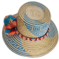 Summer straw hat with vibrant handmade details and cultural symbolism