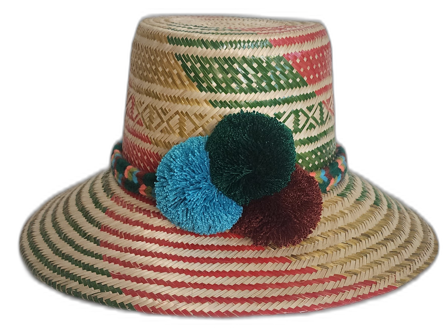 Iraca palm straw hat with traditional Wayuu patterning in festive hues and bold pompom embellishment.
