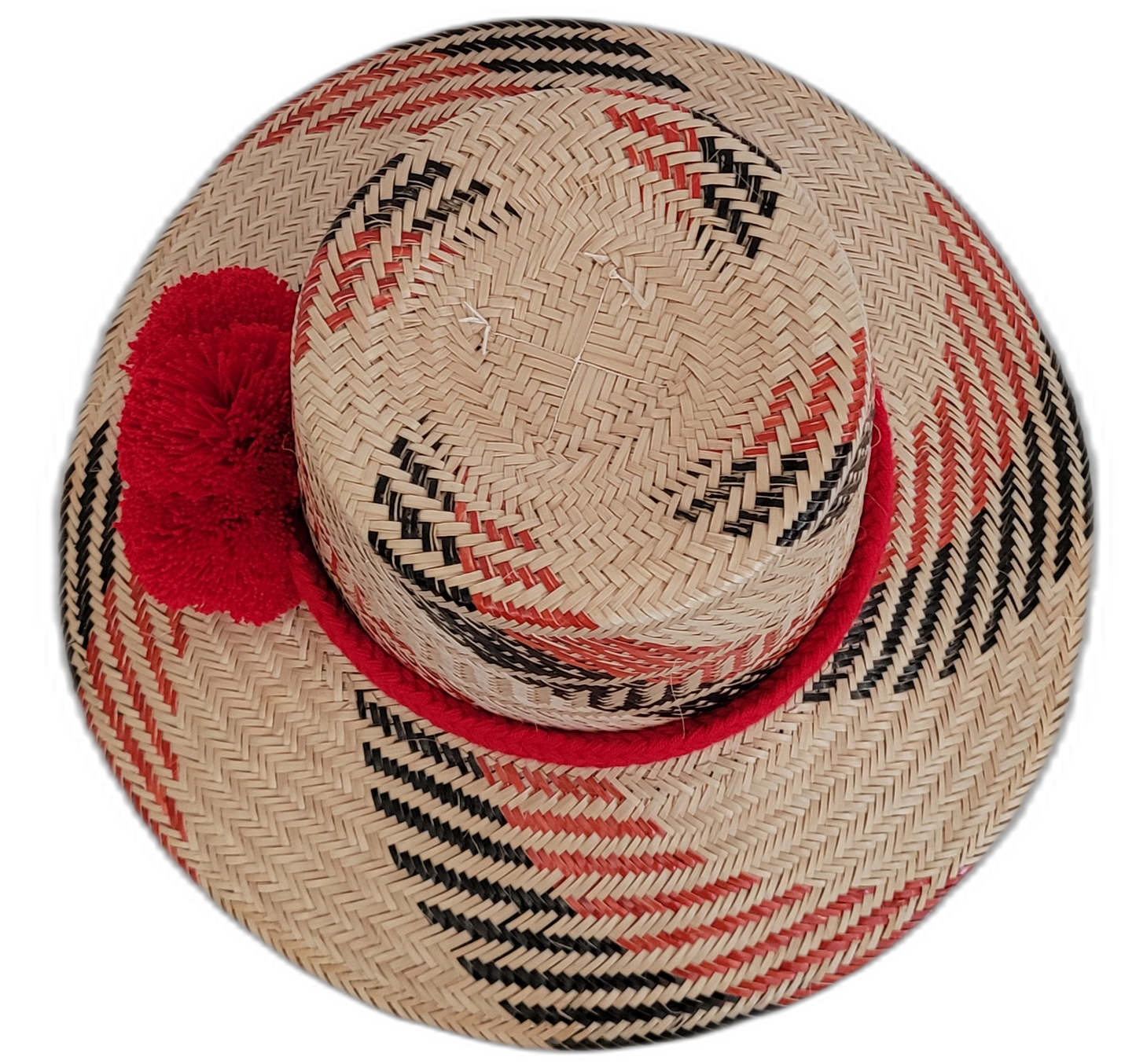 Unique black and red Wayuu straw hat, handmade with red decorative pompoms.

