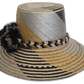 Boho straw hat with natural, brown, and black tones and handwoven details.