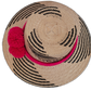 Colorful Wayuu handmade straw hat with black and pink design, perfect for boho style.

