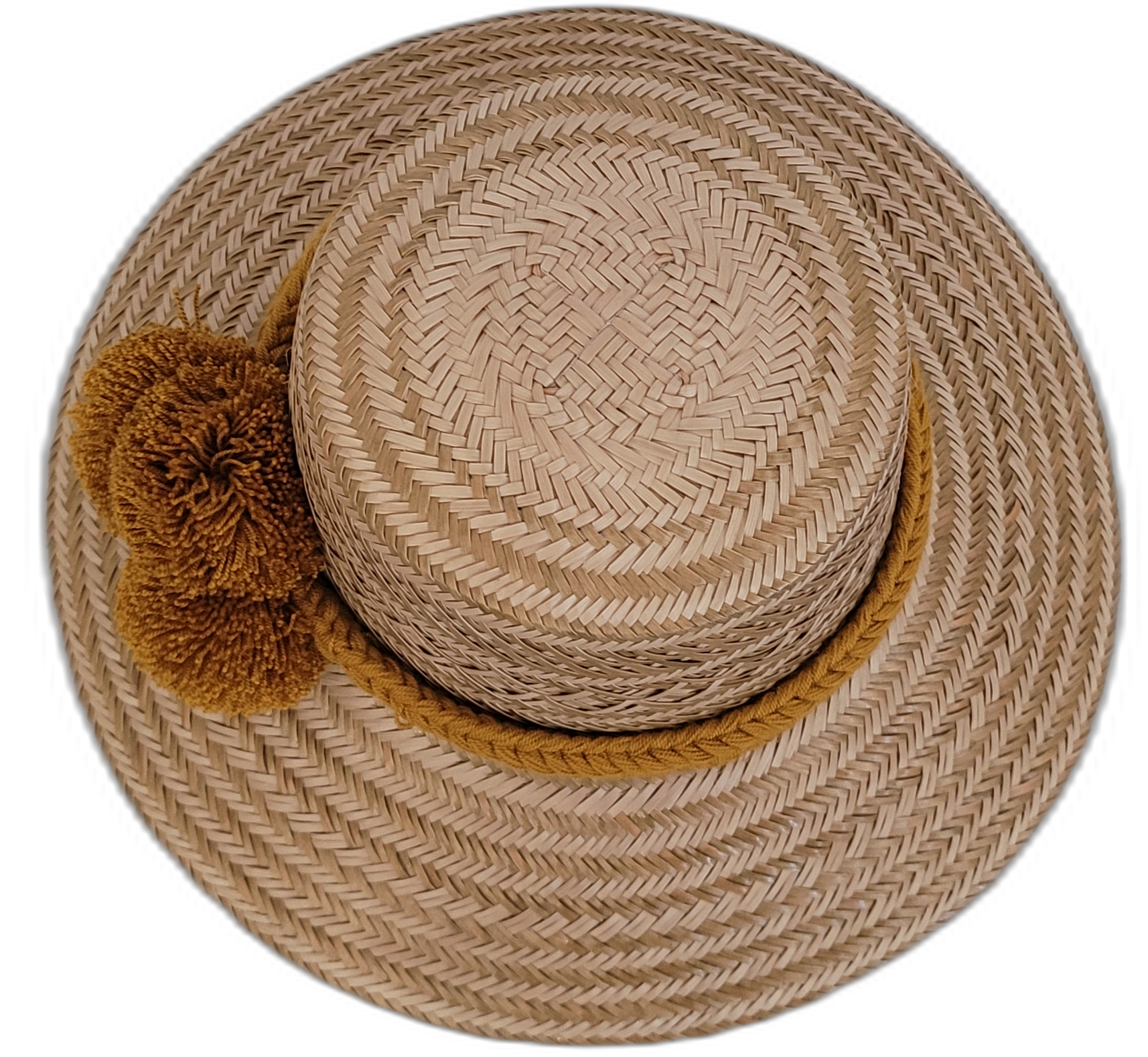 Wayuu artisan straw hat featuring natural tones and golden pompoms for boho style.

