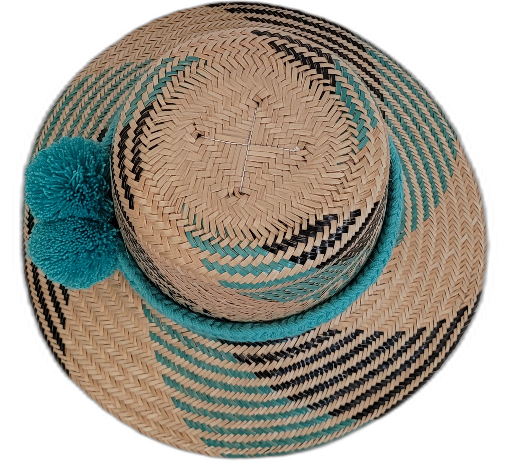 Handwoven Wayuu straw hat with turquoise accent pompoms and bohemian design.

