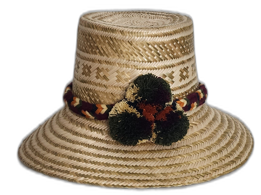 Handmade Wayuu hat with forest green, rust, and golden pompoms.Athena handmade Wayuu hat with tan weave and forest green, orange, and cream pompoms