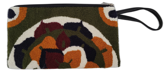 Handmade boho clutch with floral-inspired punch needle design and black wrist strap

