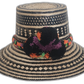 Boho Straw Hat in black and beige with colorful handmade pompoms by Wayuu artisans