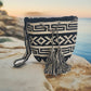 Handmade Wayuu bag in black and cream with bold tassels