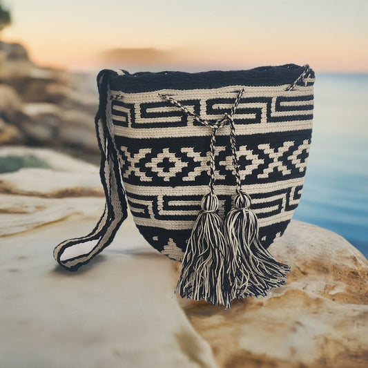 Handmade Wayuu bag in black and cream with bold tassels