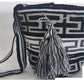Monochrome boho chick crochet bag featuring traditional Wayuu design and adjustable strap.