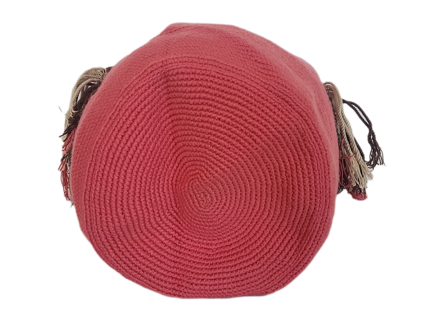 Colorful handmade Wayuu bag with bold pink body and intricate strap and tassel accents — ideal for boho-chic looks with cultural flair.
