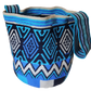 Bohemian handmade Wayuu bag in cool tones with traditional Wayuu designs.