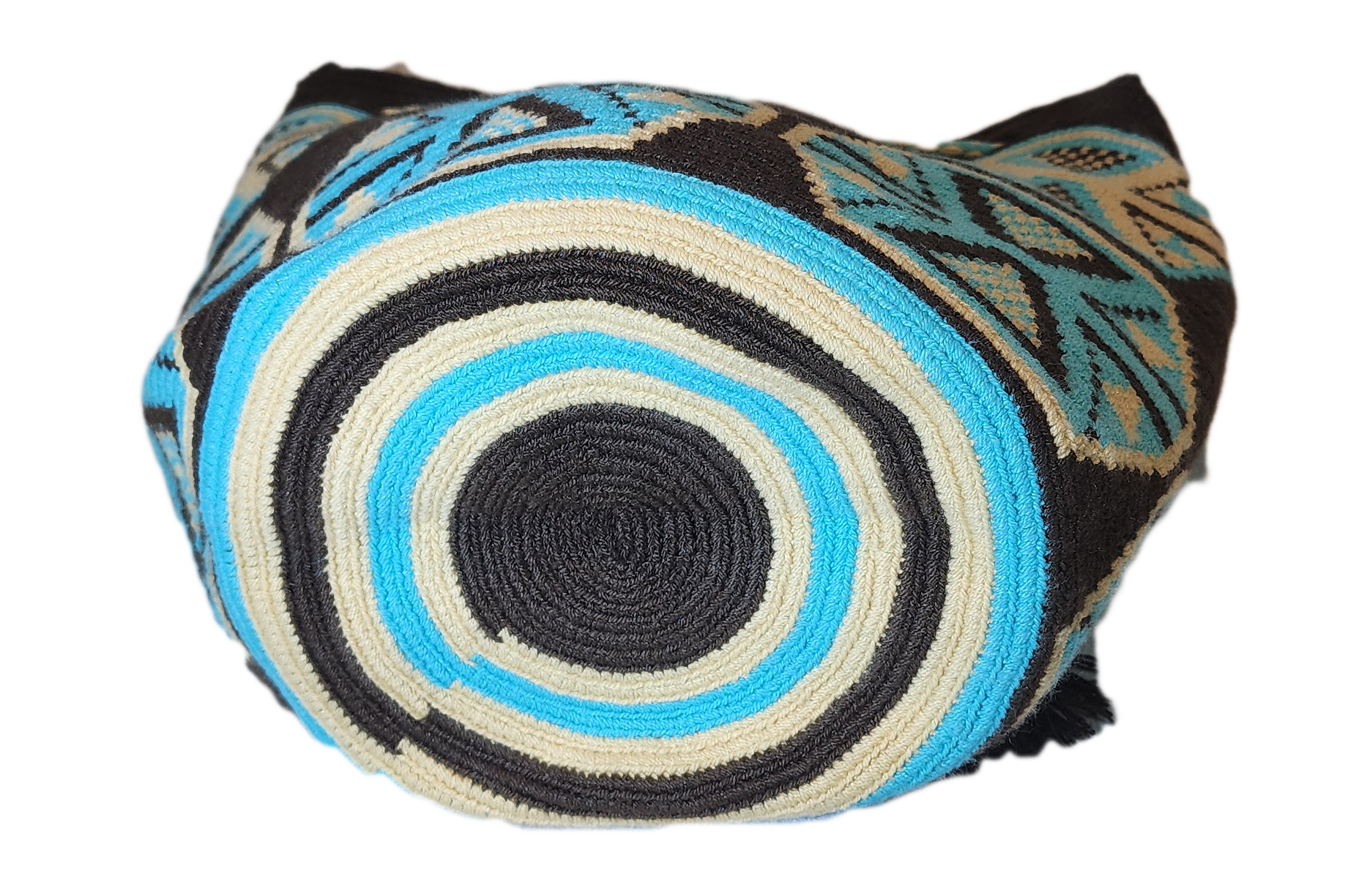 Bohemian handmade Wayuu bag featuring triangle patterns and braided strap.