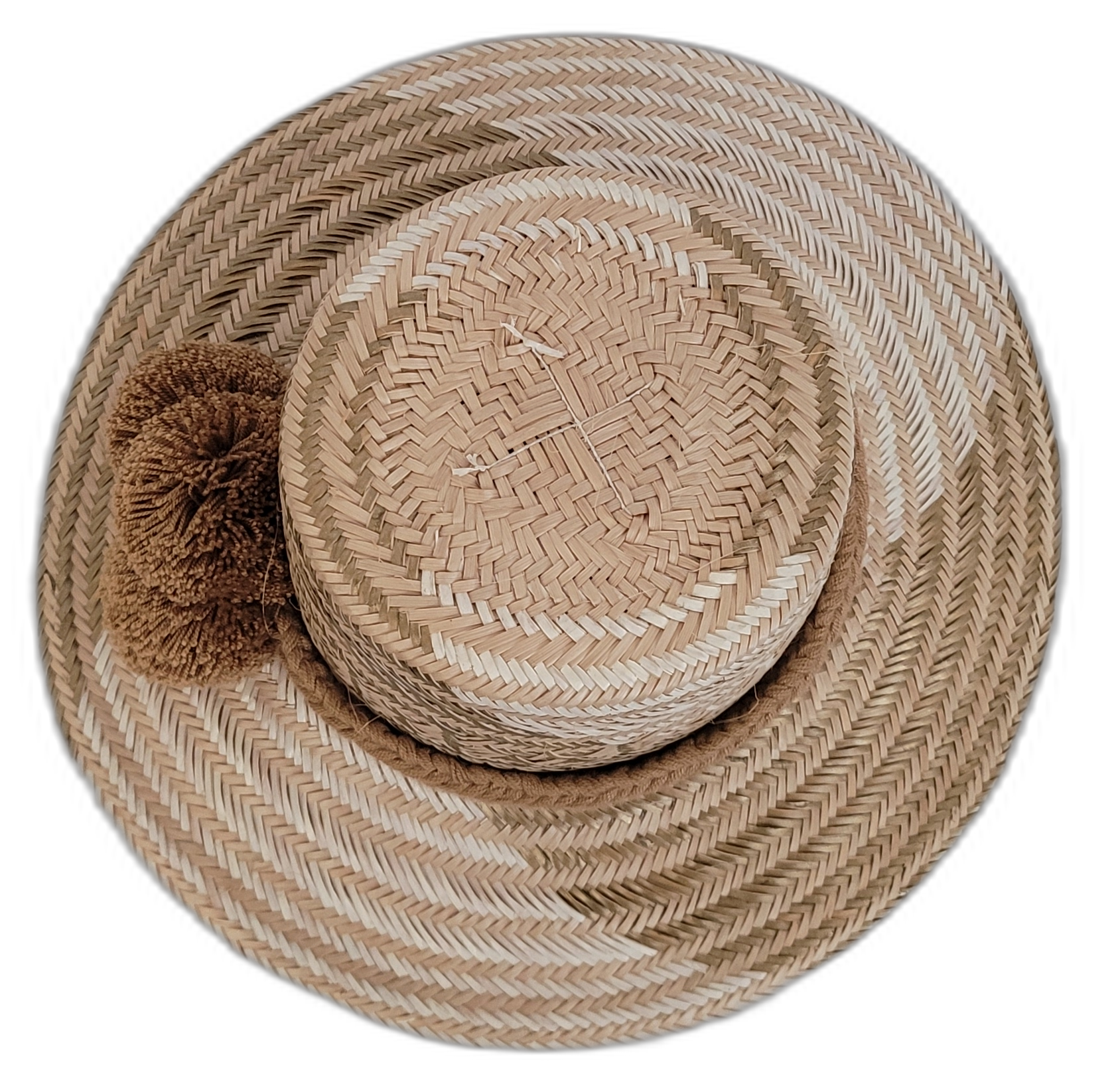 Elegant earthy Wayuu straw hat with handmade details and brown pompoms.

