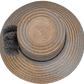 Elegant gray Wayuu straw hat with handmade details and gray pompoms.

