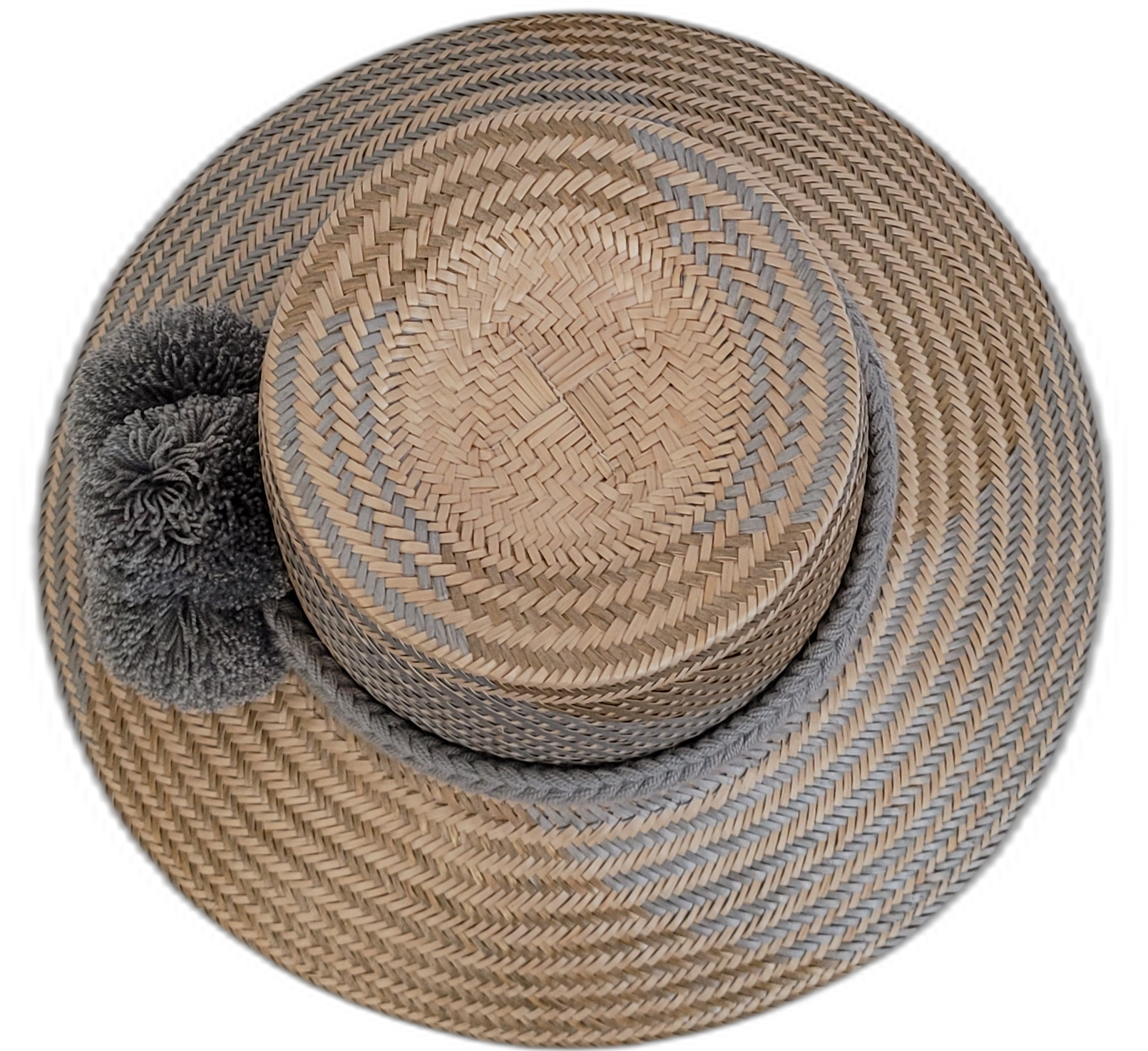 Elegant gray Wayuu straw hat with handmade details and gray pompoms.

