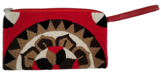 Fair trade boho chic punch needle clutch with traditional Wayuu craftsmanship.

