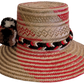 Bohemian handmade hat featuring red and beige palm weave with large pompoms