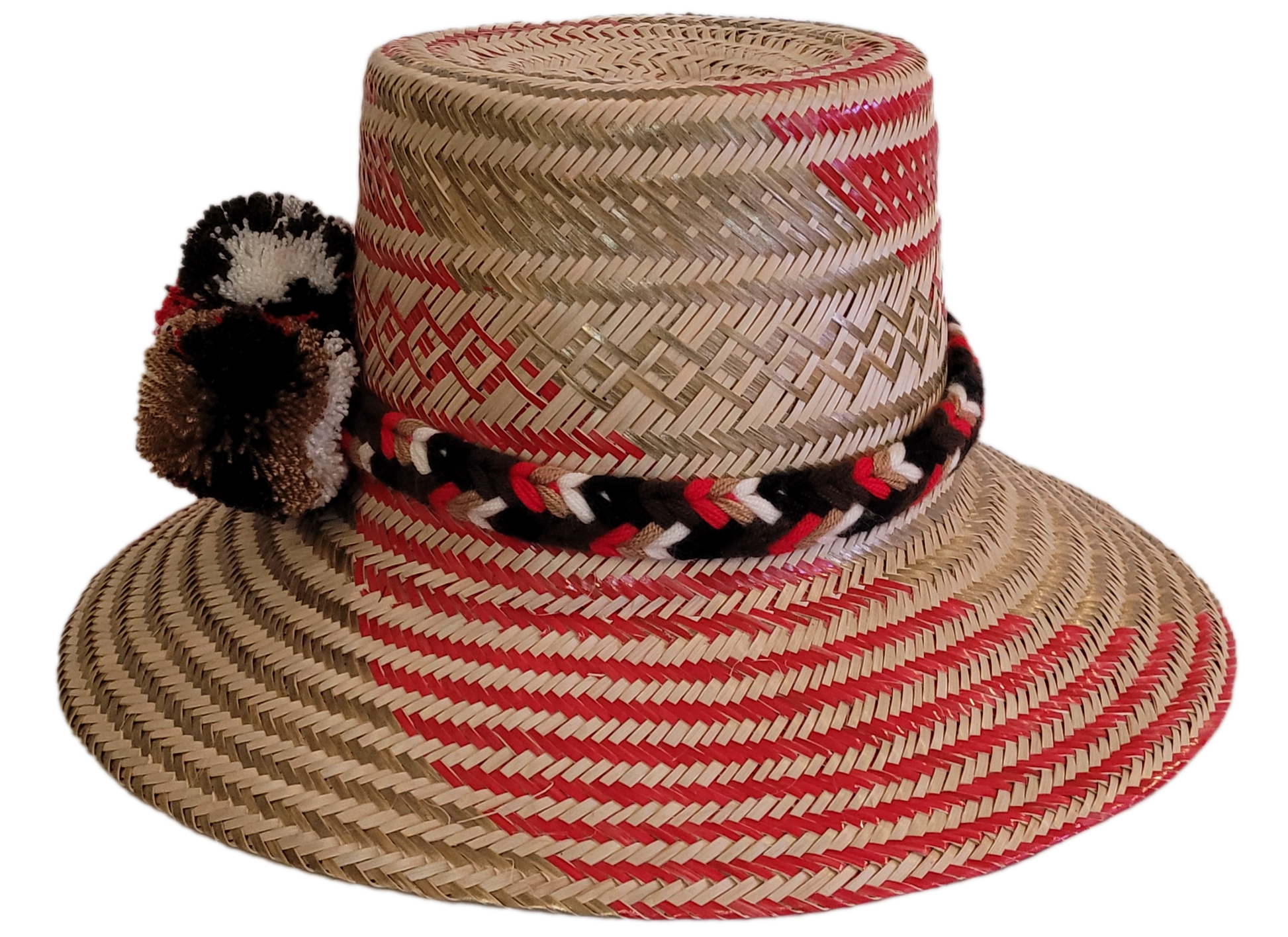 Bohemian handmade hat featuring red and beige palm weave with large pompoms
