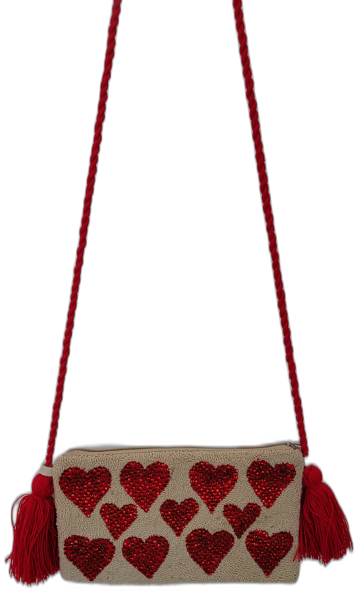 Mikaela handmade Wayuu clutch with red heart embroidery and braided tassel strap

