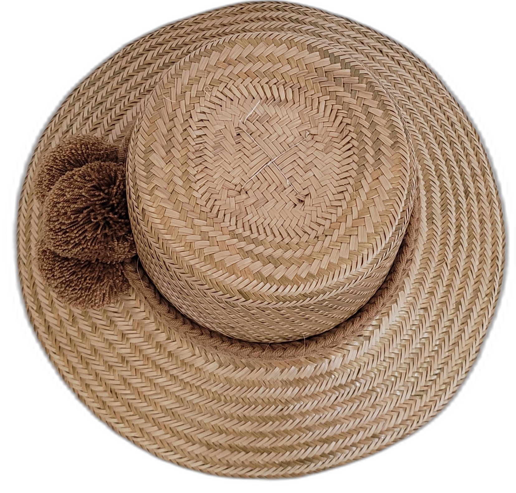 Natural Wayuu artisan hat, solid straw with brown pompom details.

