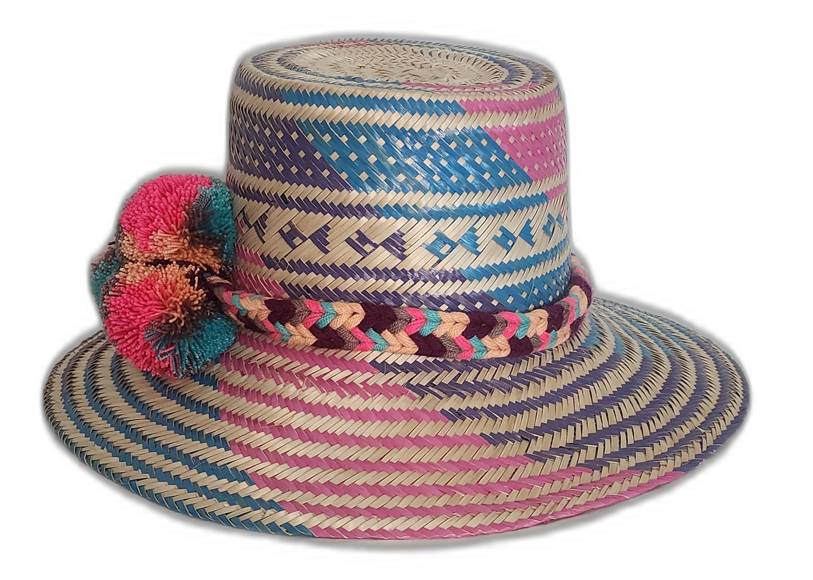 Boho straw hat featuring bright artisan patterns and large pompoms
