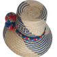 Colorful Wayuu hat crafted from Iraca palm with red and navy accents
