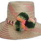 Boho chic Wayuu hat with green, orange, and pink pompoms and artisan braided band.Boho straw hat featuring artisan Wayuu weave in light pink tones

