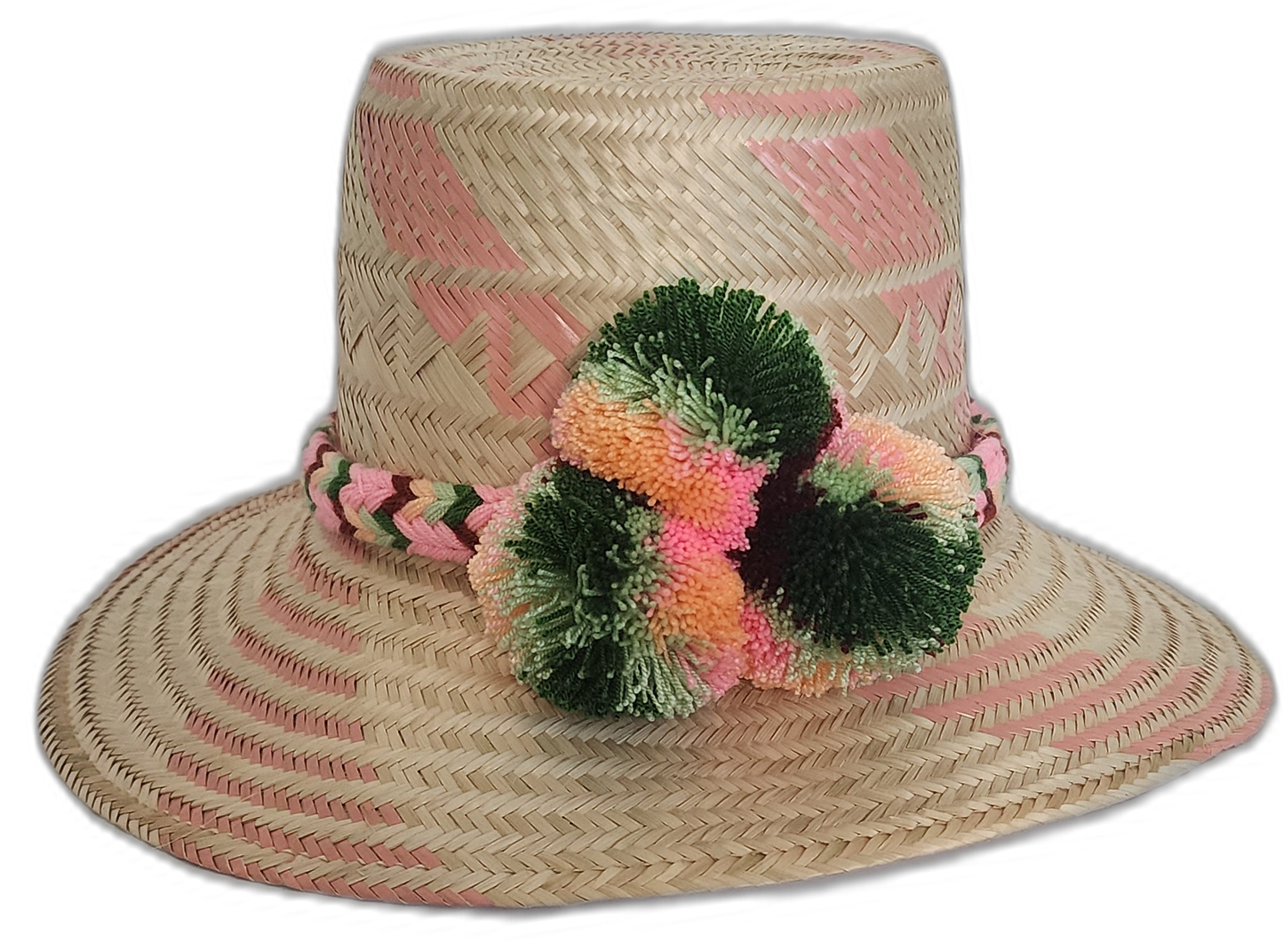Boho chic Wayuu hat with green, orange, and pink pompoms and artisan braided band.Boho straw hat featuring artisan Wayuu weave in light pink tones

