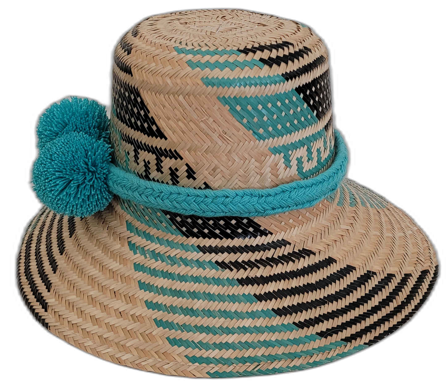 Boho-chic Wayuu straw hat featuring turquoise pompoms and handwoven details.

