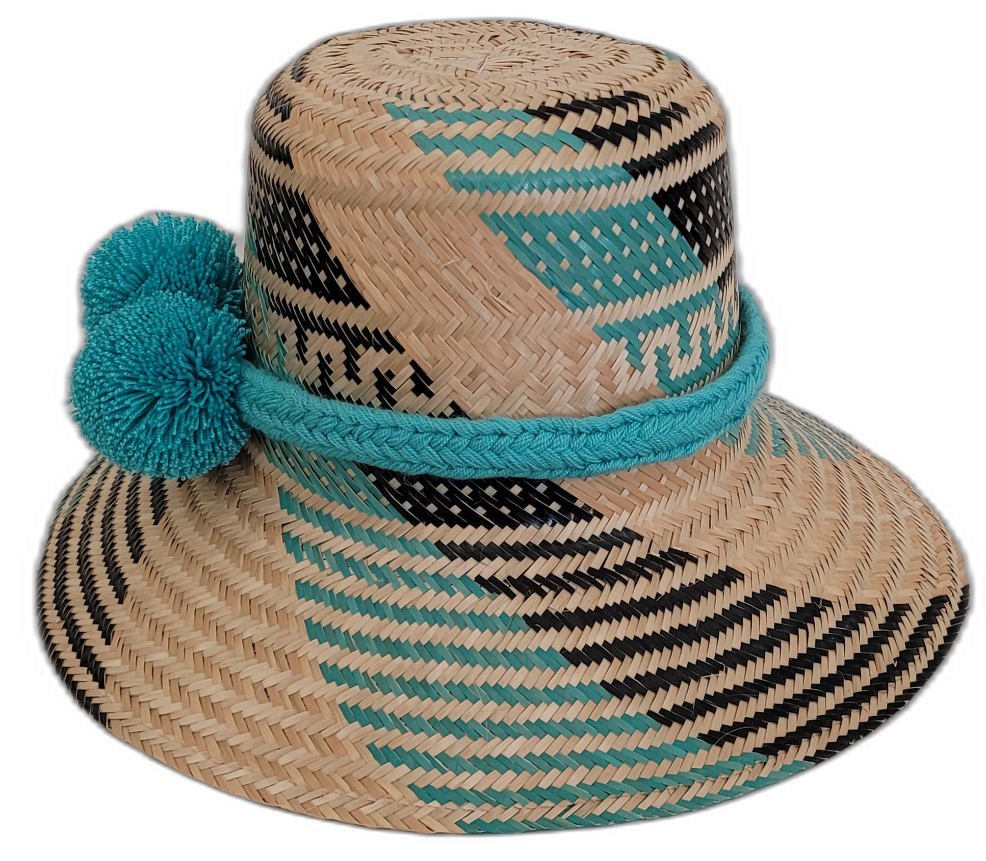 Boho-chic Wayuu straw hat featuring turquoise pompoms and handwoven details.

