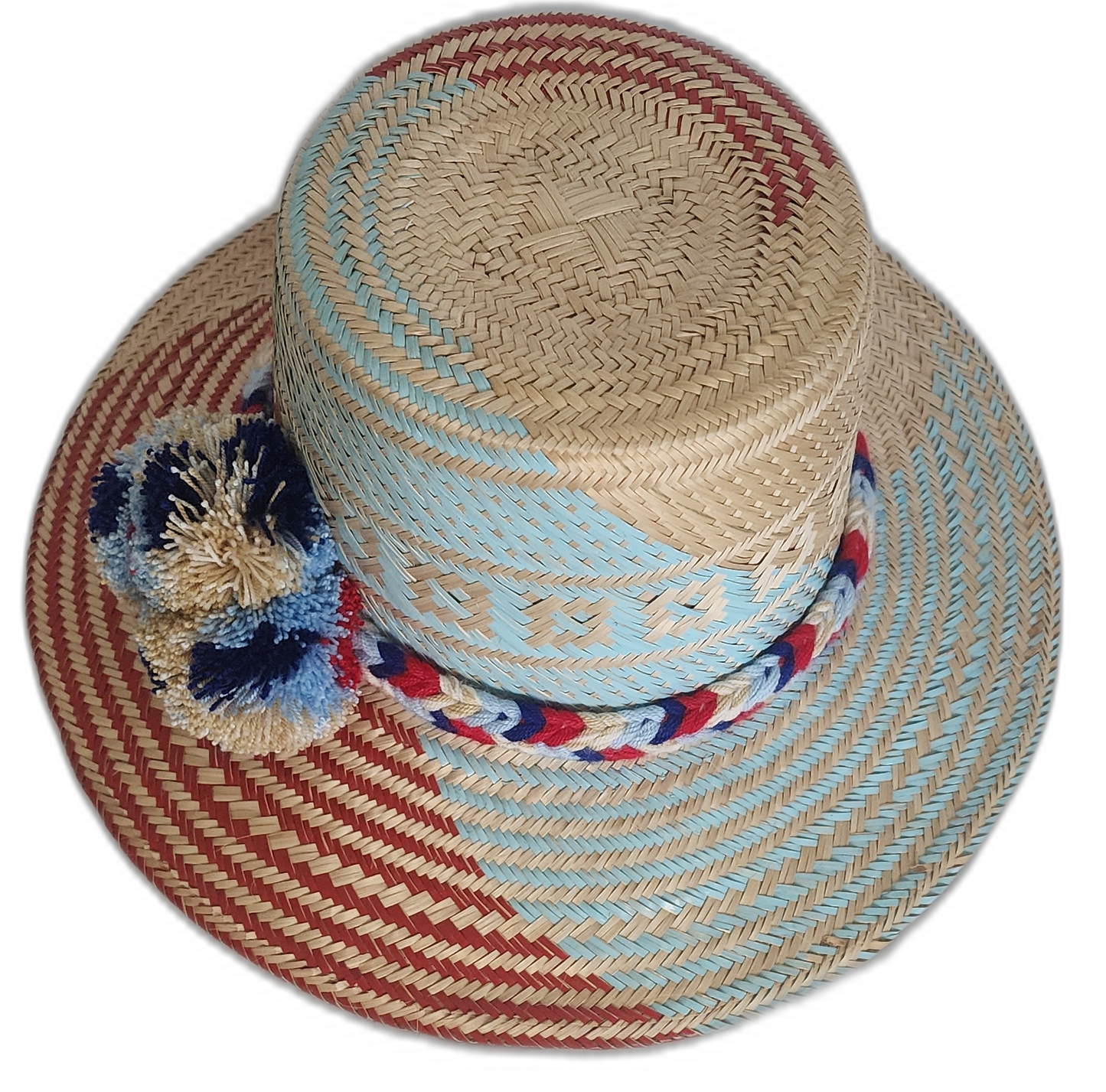Colorful Wayuu hat with red, navy, and baby blue pompoms