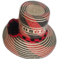 Bohemian straw hat with symbolic patterns and deep color