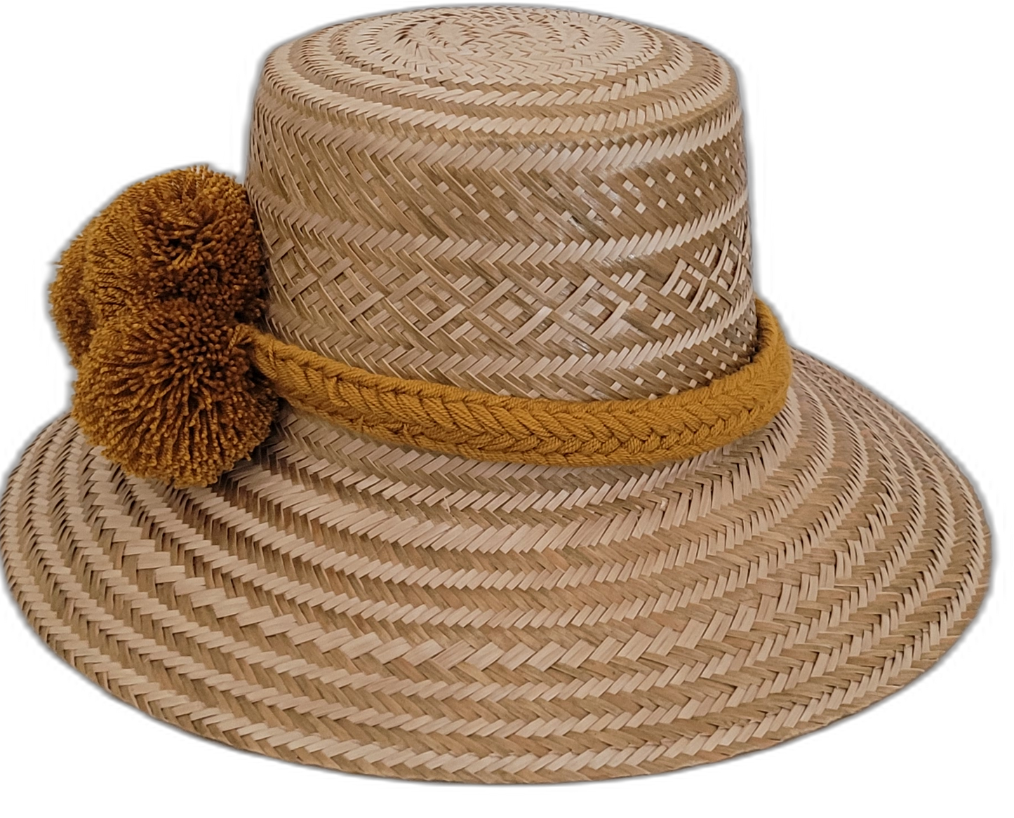 Artisan-crafted Wayuu hat in natural straw with bold golden braided pompoms.

