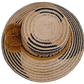 Wayuu handmade hat, colorful and lightweight, with mustard pompoms and detailed black design.

