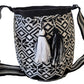 Bohemian crochet shoulder bag with monochrome Wayuu patterns, perfect for boho-chick style.
