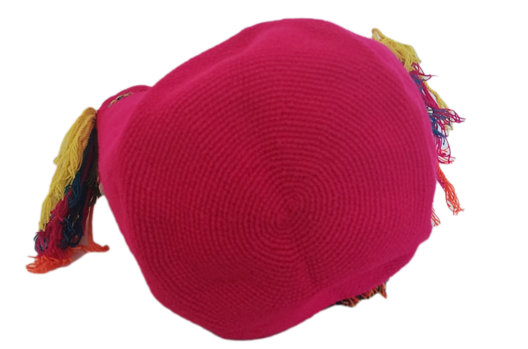 Boho-style hot pink Wayuu crochet bag with eye-catching rainbow details — artisan and handmade accessory.