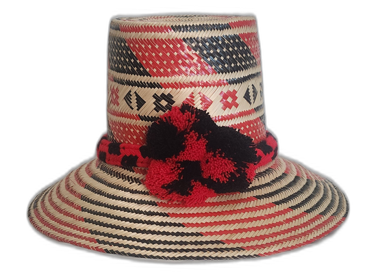 Boho hat with tribal black and red patterns and matching artisan pompoms

