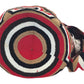Artisan handmade boho bag with vivid crochet patterns, colorful tassels, and Wayuu style