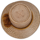 Natural Wayuu straw hat designed with warm ochre pompoms.

