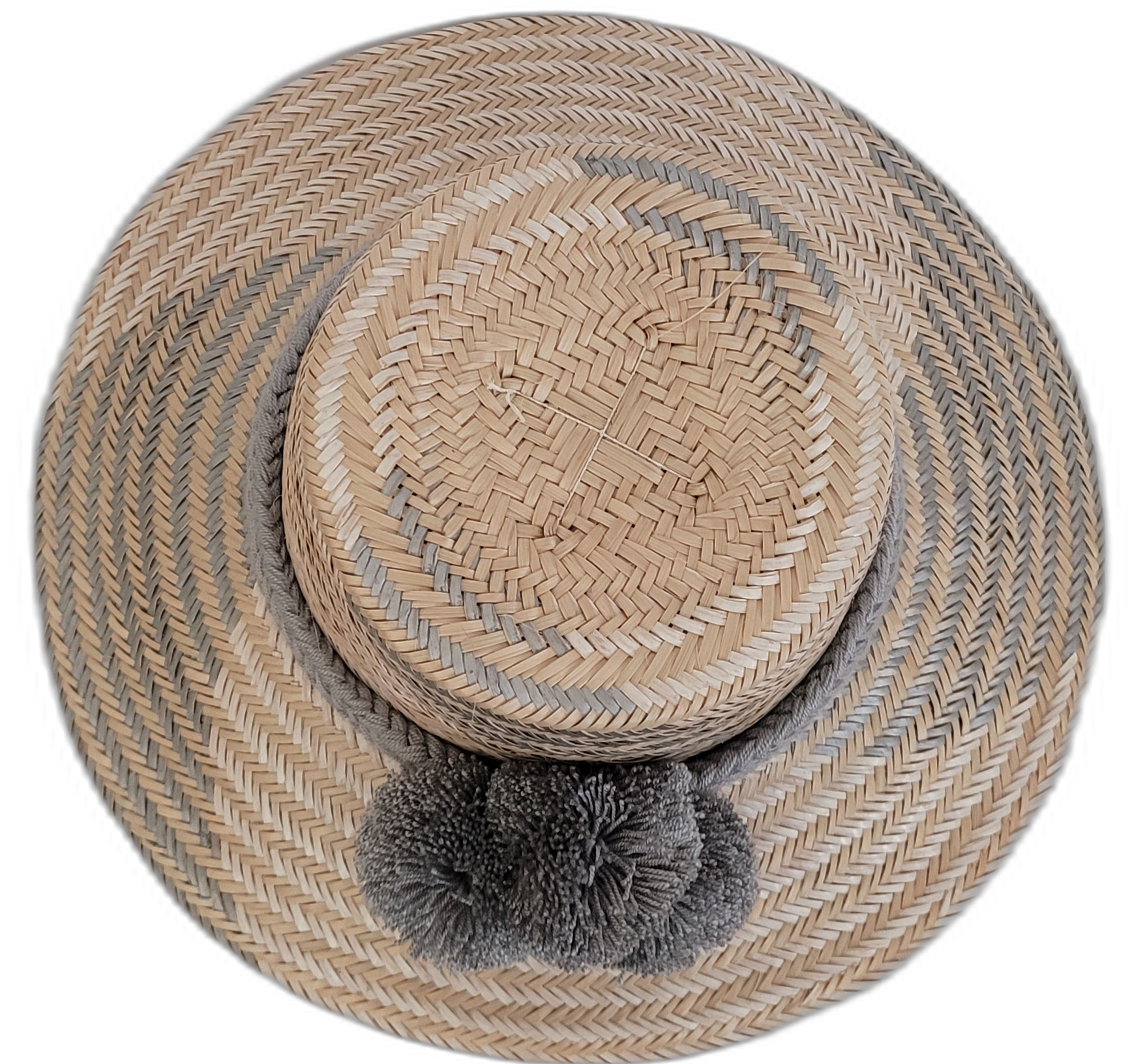 Bohemian Wayuu hat, handwoven with gray accents, featuring gray pompoms.

