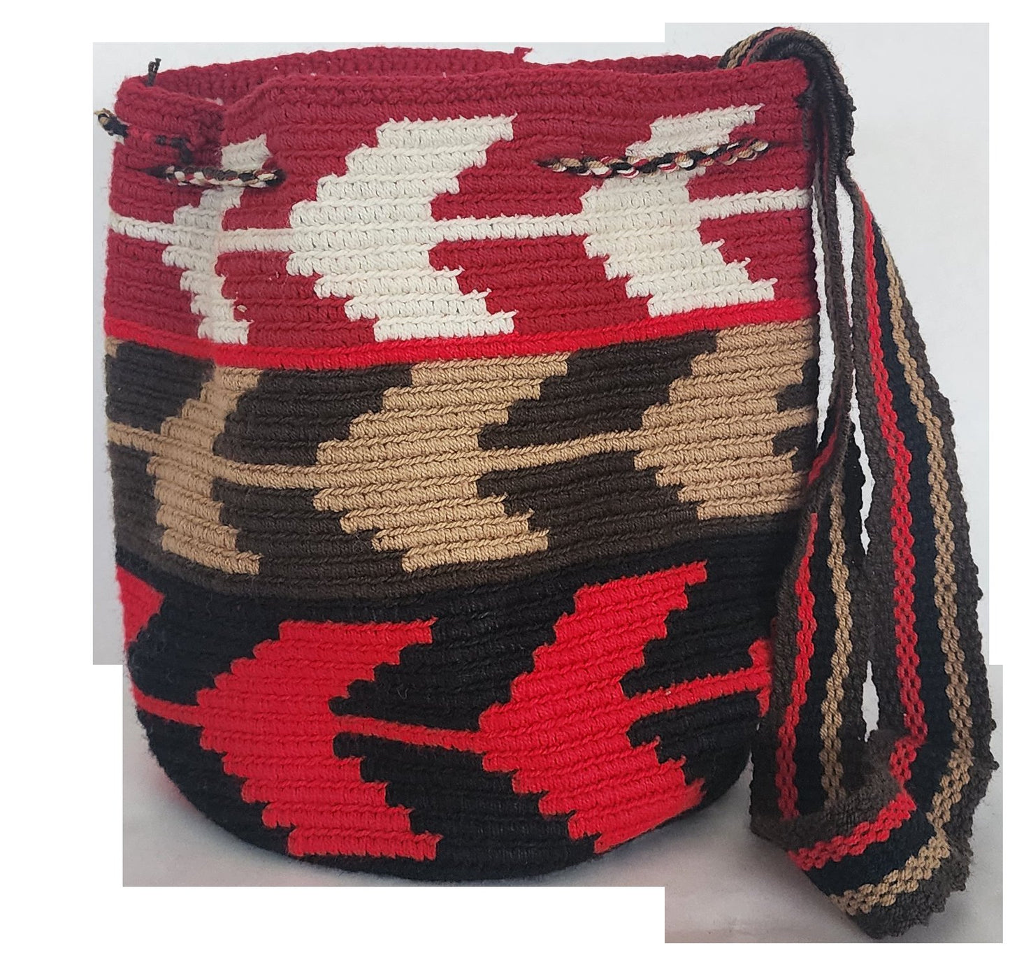 Artisan-crafted Wayuu shoulder bag with red, tan, and black color blocks and crochet tassels — a bold, handmade boho accessory.