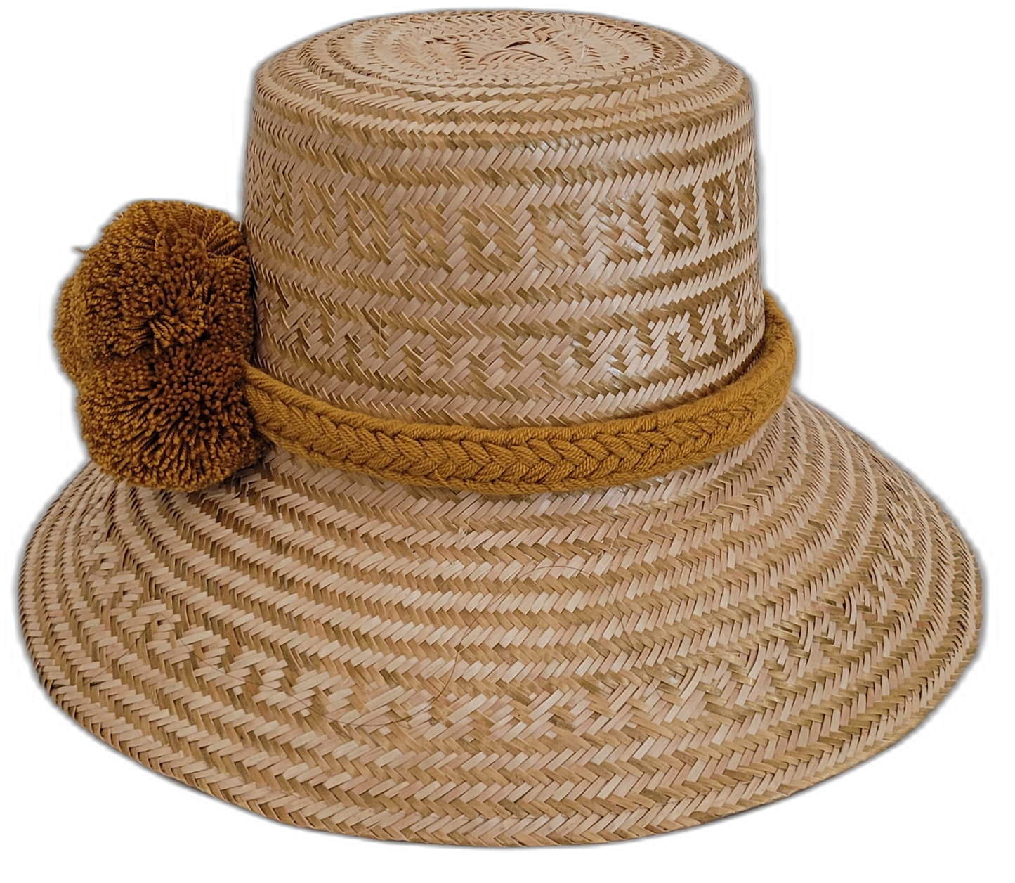 Boho Wayuu hat crafted from natural straw and decorated with ochre pompoms.

