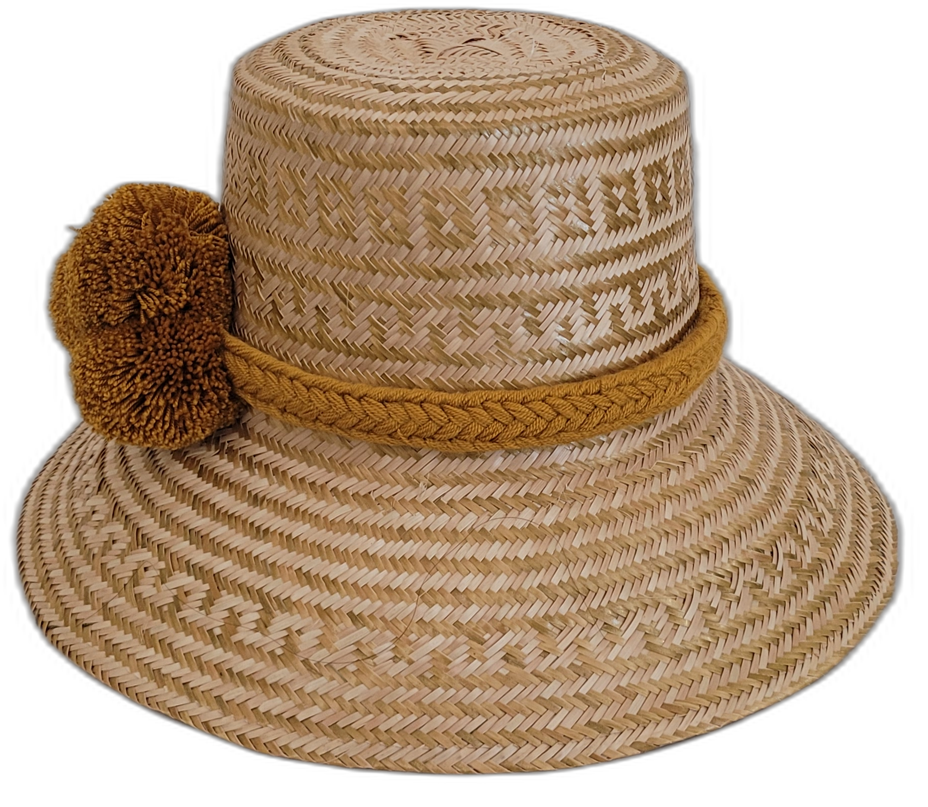 Boho Wayuu hat crafted from natural straw and decorated with ochre pompoms.

