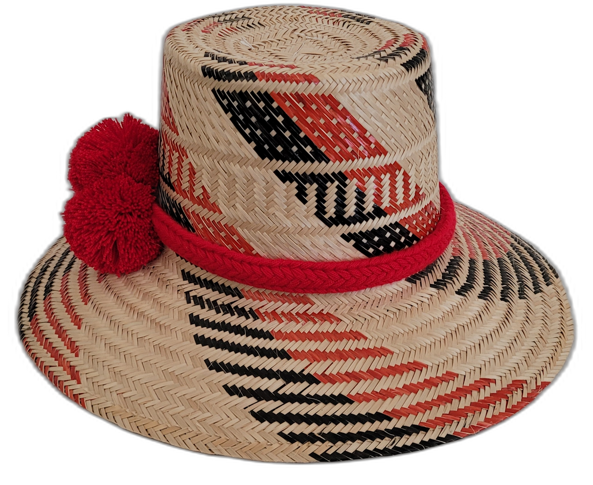 Bohemian Wayuu hat, handwoven with black and red patterns, featuring red pompoms.

