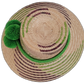 Boho Chic hat, Wayuu artisan-made, straw hat with vibrant green pompoms and purple-beige details.

