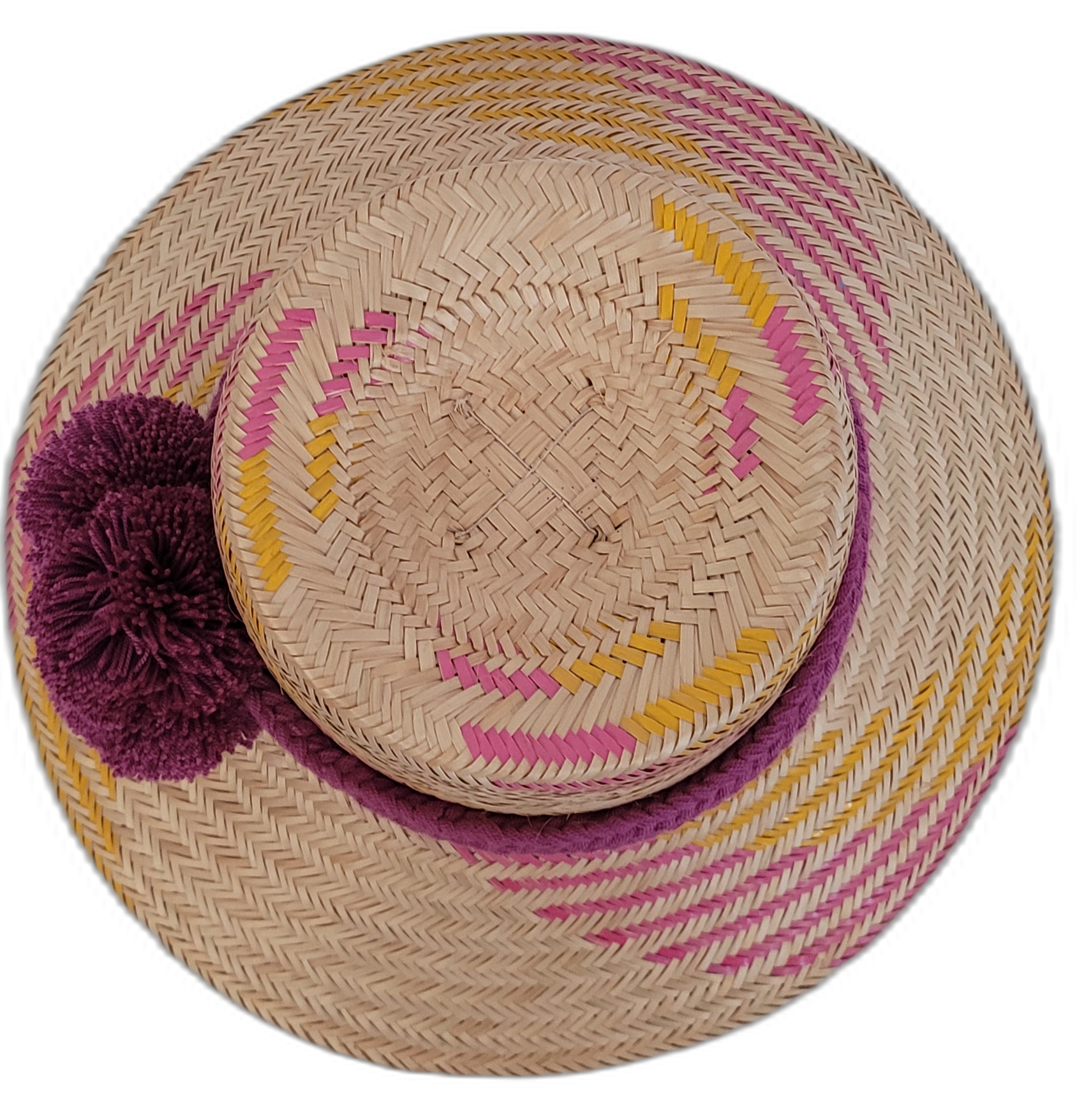 Boho Chic hat, Wayuu artisan-made, straw hat with vibrant pink, yellow, and purple designs, adorned with pompoms.