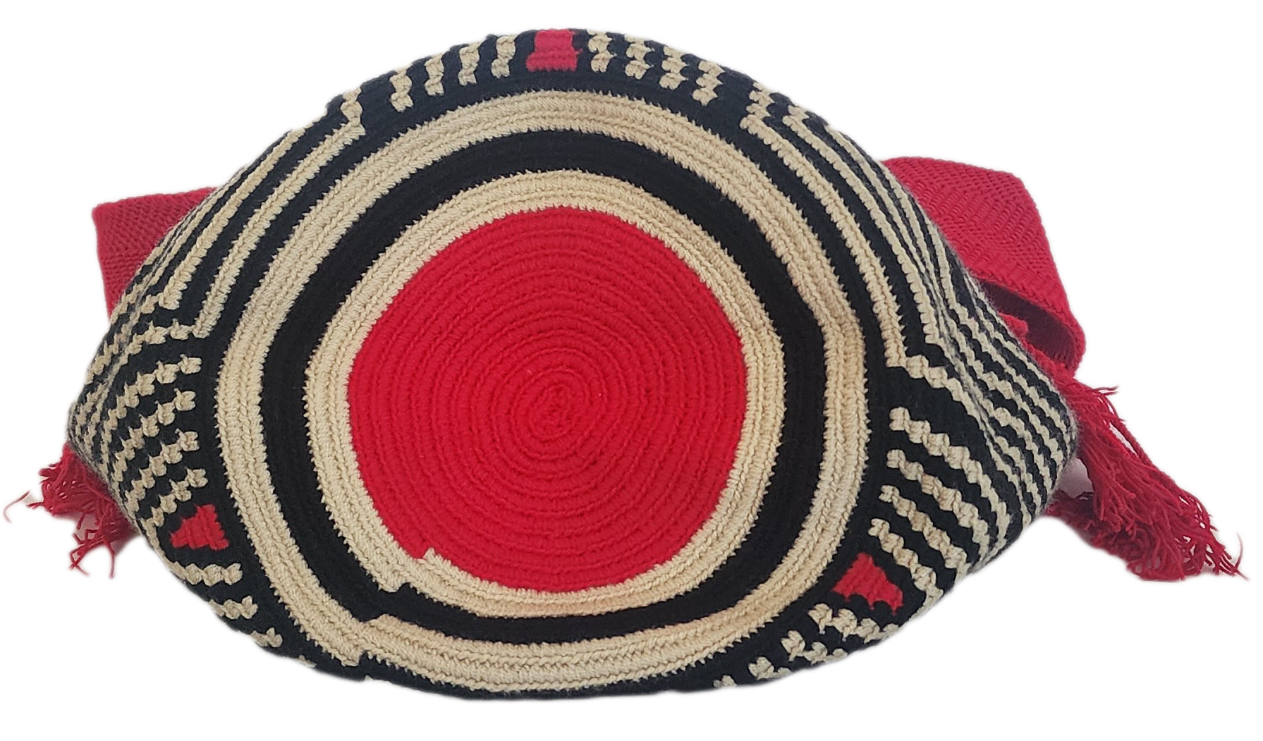 Colorful handmade Wayuu crochet bag in modern tribal pattern with vivid red accents and tassels — perfect for bold boho-chic fashion lovers.