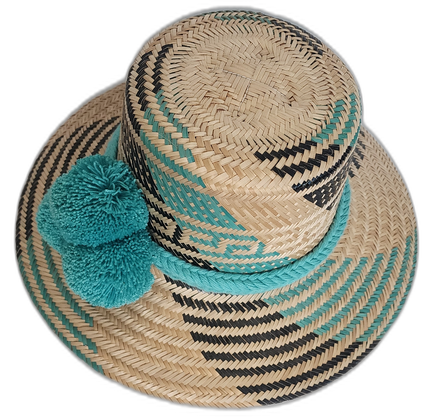 Wayuu hat with vibrant turquoise pompoms and contrasting black geometric designs.